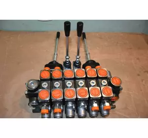 Гидрораспределитель Р100 импортный с джойстиками 100 л/мин 6 секций на экскаватор ЮМЗ 2621 Гидрораспределитель Р100 импортный с джойстиками 100 л/мин 6 секций на экскаватор ЮМЗ 2621