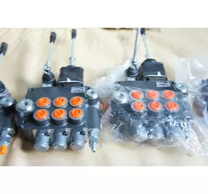 Гидравлический распределитель на мини экскаватор Гидравлический распределитель на мини экскаватор