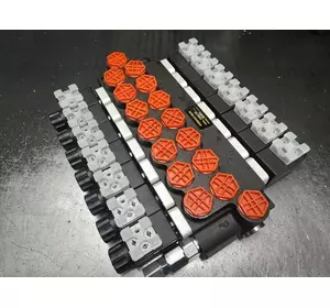 Гідророзподільник з електрокеруванням 7 секції Z50 24 вольти корейський Гідророзподільник з електрокеруванням 7 секції Z50 24 вольти корейський